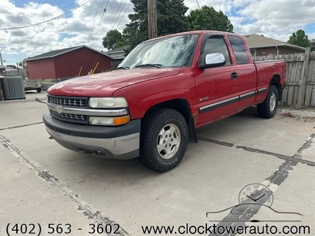 2002 Chevrolet Silverado  Silverado in front of Clock Tower Mall Used car business