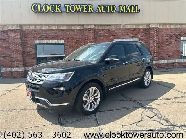 2019 Ford Explorer Explorer in front of used car dealership