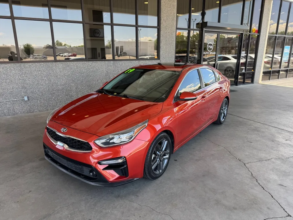 2019 Kia Forte Forte in front of used car dealership